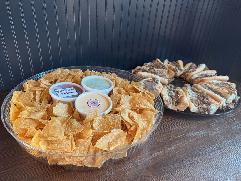 Chips and dips Trifecta tray — chips with salsa, queso and guacamole